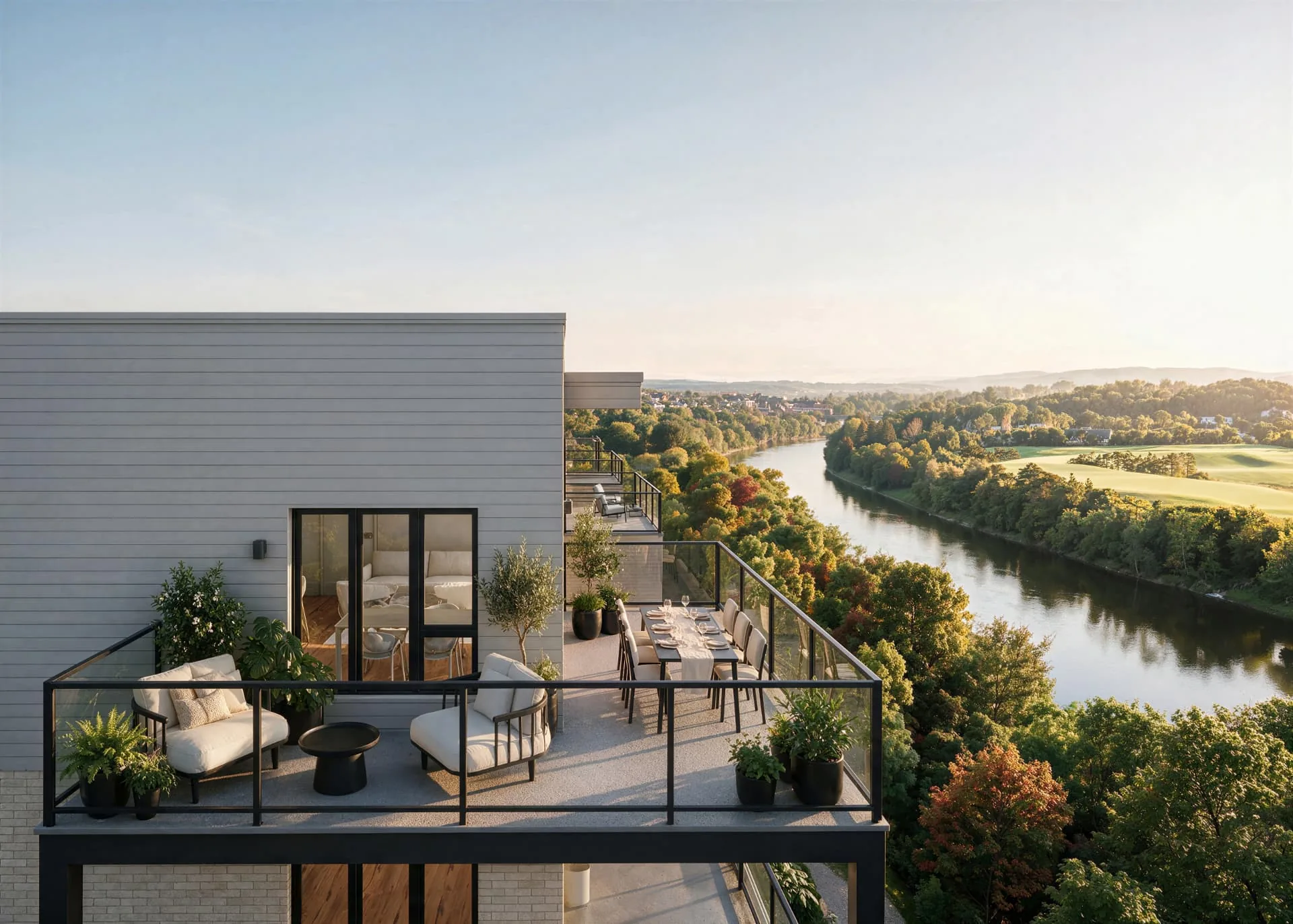 Terrasse privée d'une unité du Domaine Arboit donnant sur la rivière
